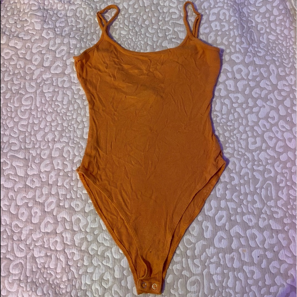 Orange ribbed tank top bodysuit